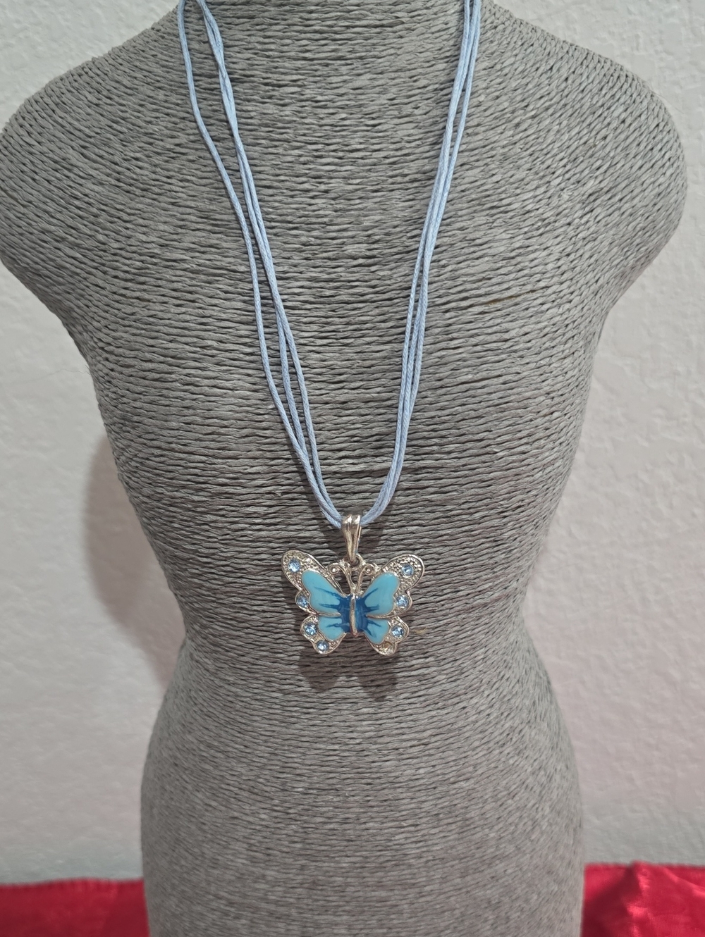 Blue Butterfly Pendant Necklace - Light Blue Multi-Strand Cord